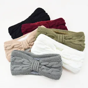 Cable knit bow headband fleece lined warm winter ear warmer hair accessory for women.