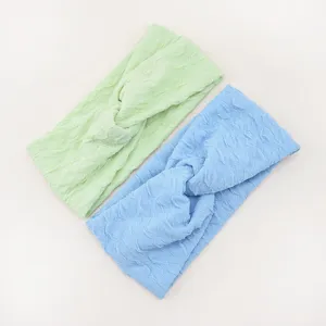 Crinkled bubble fabric twisted hairband detail shot, soft wide headband for daily wash and yoga.