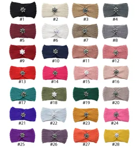 Knitted headband with rhinestone flower, cozy winter warm hair accessory for women.