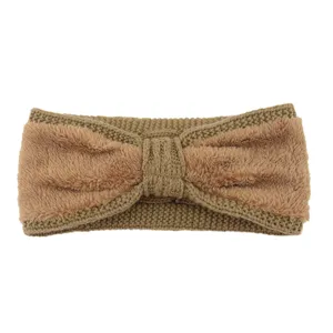 Knitted fleece bow headband winter warm ear warmer fluffy hair accessory detail shot