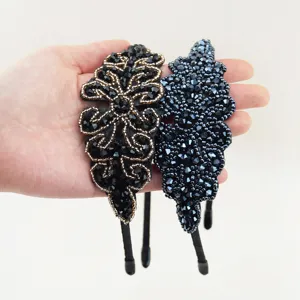 Detailed close-up of handmade beaded crystal hairbands with intricate floral beadwork.
