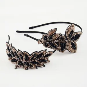 Handmade beaded leaf headband with sparkling black crystals and elegant design for women.