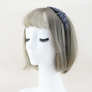 Detailed view of black crystal beaded headband, exquisite rhinestones and alloy band design.