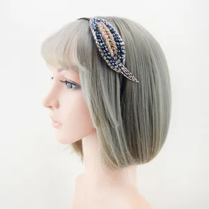 Detailed shot of the crystal leaf beaded headband, exquisite alloy hair accessory closeup.