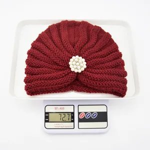 Wine red knitted turban hat with elegant pearl rhinestone brooch for women winter.