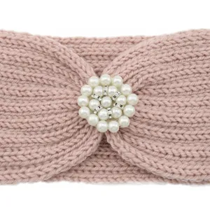 Pink knitted headband with pearl rhinestone flower detail, warm winter hair accessory.