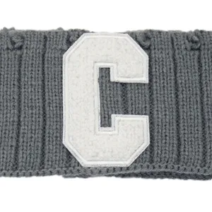 Grey knitted headband with white letter C patch, cozy warm winter hair band for sports and yoga.
