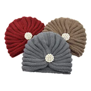 Knitted turban hat for women, winter warm beanie with elegant pearl decoration, solid color.
