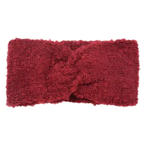 Dettaglio fascia per capelli intrecciata in morbida maglia peluche, accessorio sportivo yoga.
