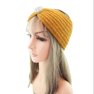 Yellow knitted headband with pearl decoration, cozy winter hair accessory for daily wear.