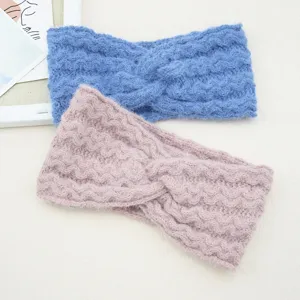 Cozy fuzzy knit twist headband for women, stylish wave pattern winter hair accessory warm.