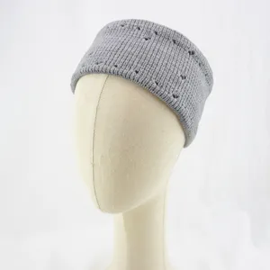 Grey knitted headband detail view, soft wool hollow out hair band for yoga and sports wear.