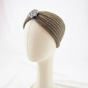 Brown knitted rhinestone headband detail showing sparkling crystal decorative accent.