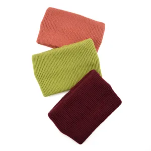 Detailed close-up view of soft knitted winter headbands showing fine fabric texture details.