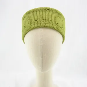 Green knitted distressed headband detail shot, showing the double-layer wool texture.