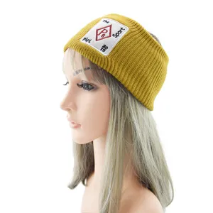 Bandeau de sport en tricot jaune pour femme, large bandeau élégant avec patch brodé.