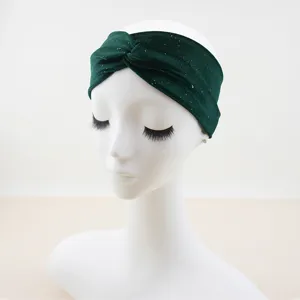 Dark green velvet knotted headband with glitter specs, elastic yoga sports hair accessory.