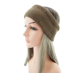 Detail view of brown knitted headband showing texture, perfect for yoga, sports and daily wear.