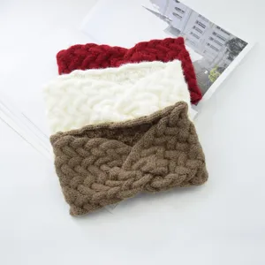 Detailed view of the winter warm knitted crossover hair band, soft wool blend, cozy accessory.