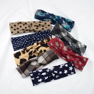 Set of stylish patterned twist headbands for sports, yoga, fitness, and face washing.