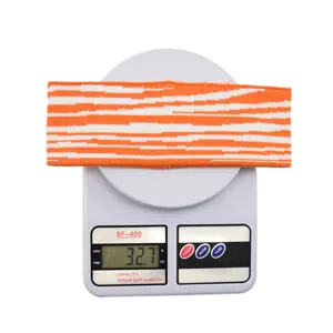 Bandeau de sport tricoté rayé zèbre orange et blanc, bandeau de yoga tendance pour femme.