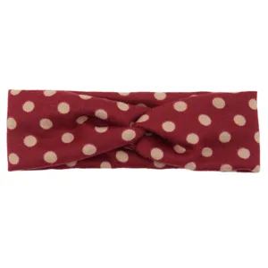 Red polka dot cross headband for women, stylish fabric knotted hair band for yoga and sports.