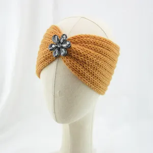 Yellow knitted headband with crystal flower decoration, warm and stylish for sports yoga daily wear.