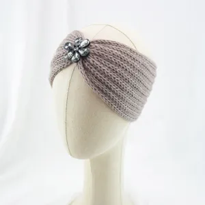 Detailed view of the knitted rhinestone flower headband, perfect ear warmer for winter daily wear.