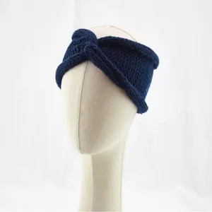 Dark blue knitted twist headband for women, winter warm ear warmer hair accessory.