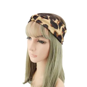 Leopard print knotted headband for women, stylish hair accessories for yoga, sports and daily wear.