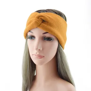 Knitted headband winter warm ear protection cross twist design soft cozy hair accessory detail