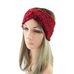 Red knitted twist headband for women, stylish winter warm hair accessory, cozy ear warmer.