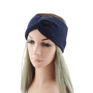 Winter warm knitted headband for women, stylish cross twist design, soft blue hair accessory.