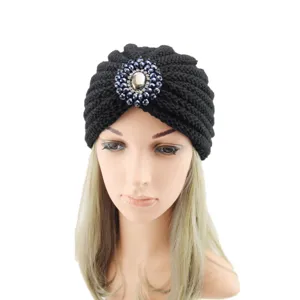 Black knitted turban hat with crystal brooch rhinestone detail, bohemian style winter headwear.