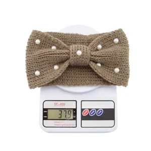 Knitted headband with pearls and bow design, soft winter warm hair hoop for daily wear.