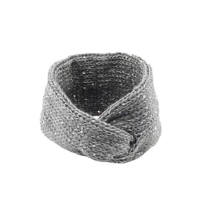Close-up detail of gray knitted twist headband with sparkling sequins, warm winter hair accessory.