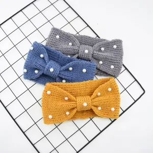 Knitted wool headband featuring elegant pearl accents and a cute bow design for daily wear.