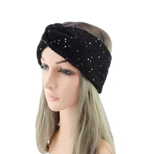 Detailed view of a black knitted sequin cross headband for women, comfortable winter hair accessory.