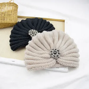 Knitted turban hat detail, winter warm plush beanie with sparkling crystal brooch ornament.