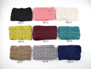 Detailed view of knitted wide braided ear warmer headband variants in multiple solid colors.