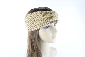 Close-up detail of the knitted headband showing the textured chunky knit and twist knot design.