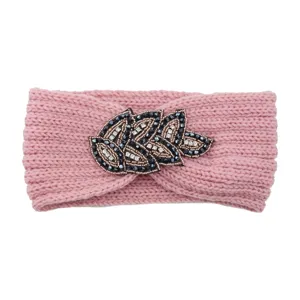 Detailed shot of pink knitted headband featuring sparkling rhinestone beaded leaf appliqué ornament.