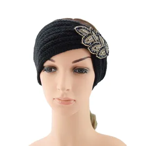 Black knitted headband with sparkling rhinestone beaded leaf applique detail for winter warmth and fashion