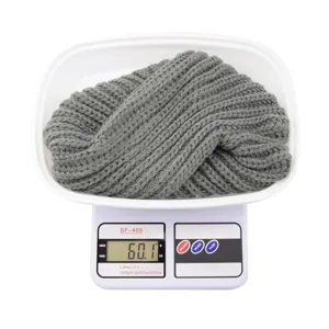 Grey knitted headband detail, soft woolen material, comfortable daily wear accessory.