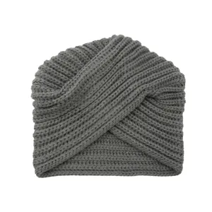 Detail view of the cozy grey knit cross turban beanie hat, showing fine yarn texture.