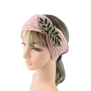 Pink knitted headband with black beaded leaf embellishment for women winter hair accessory