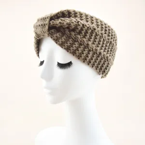 Knitted twist headband detail, thick warm wool ear warmer in khaki, winter hair accessory close up