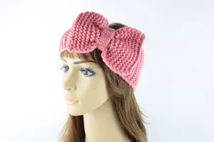Diadema de punto rosa con lazo, accesorio para el pelo cálido hecho a mano para mujeres.