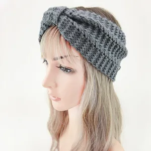 Cozy grey knitted headband for women, handmade crochet winter ear warmer hair accessory.