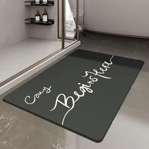 Detailed view of dark grey absorbent bathroom mat with modern English text for home floor decor.